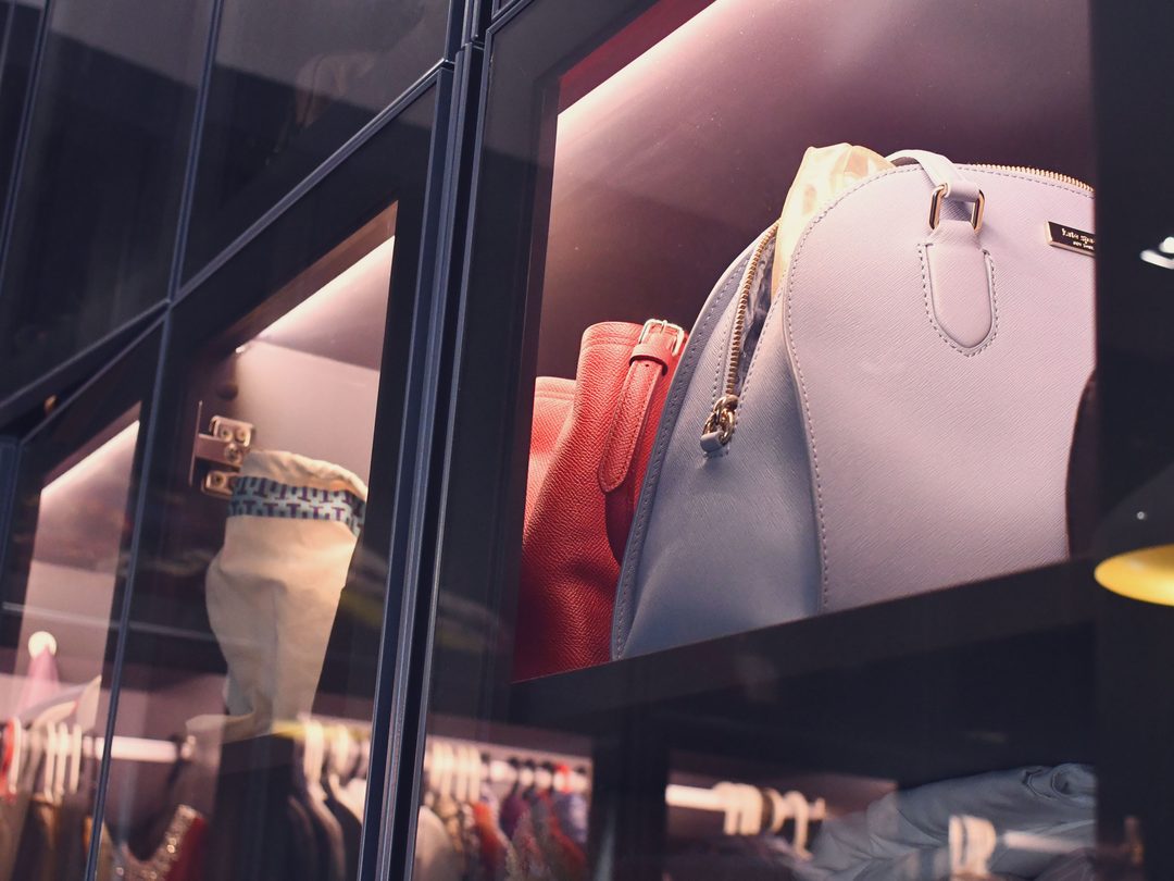 Walk-in wardrobe with glass display cabinets
