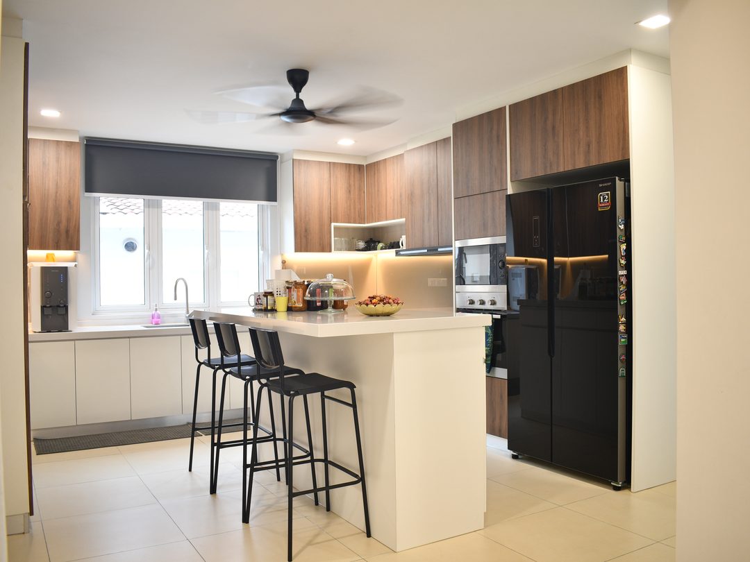 Kitchen with island seating and full-height cabinetry