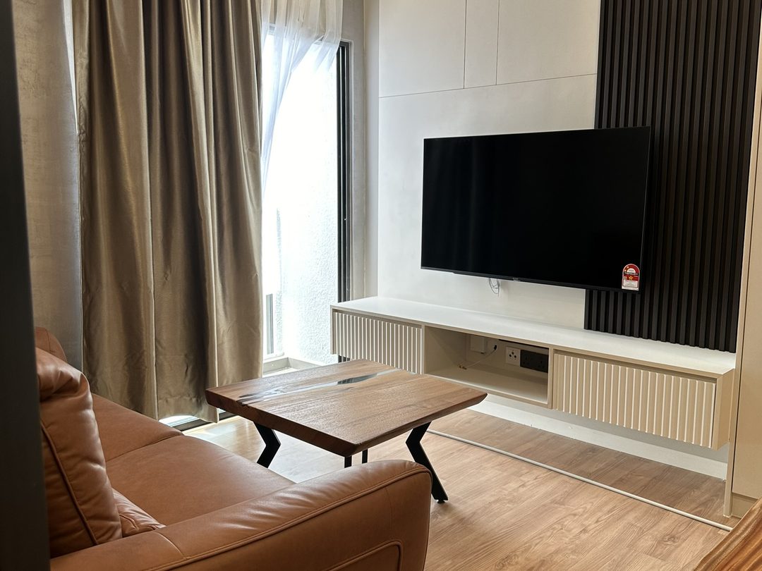 Condominium living room with fluted panel media wall, Dian Residensi