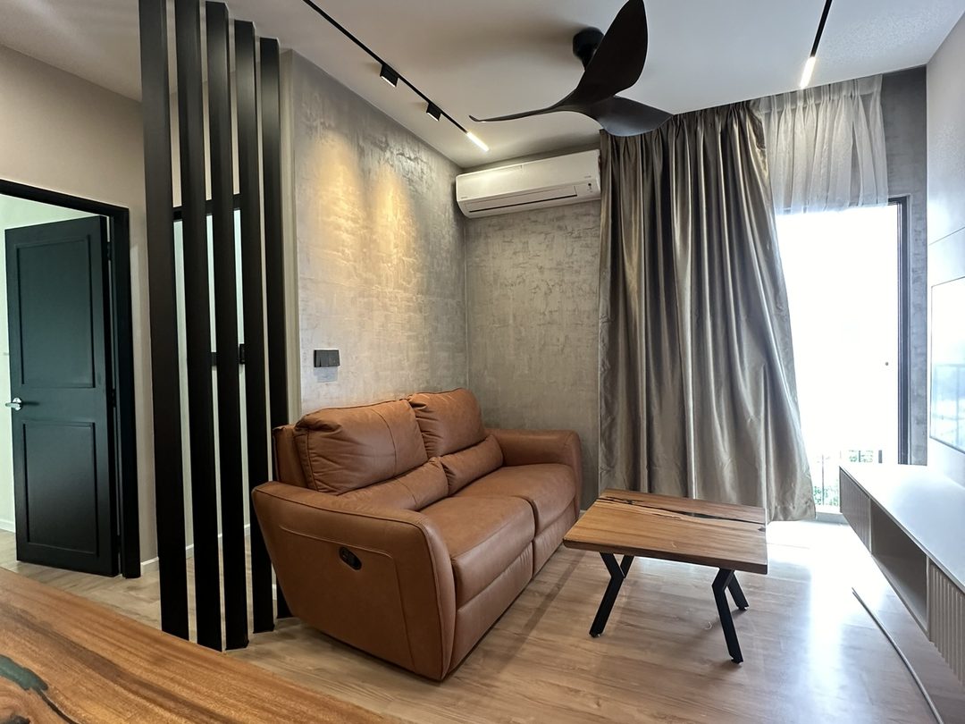 Lounge with tan leather sofa and timber slat divider