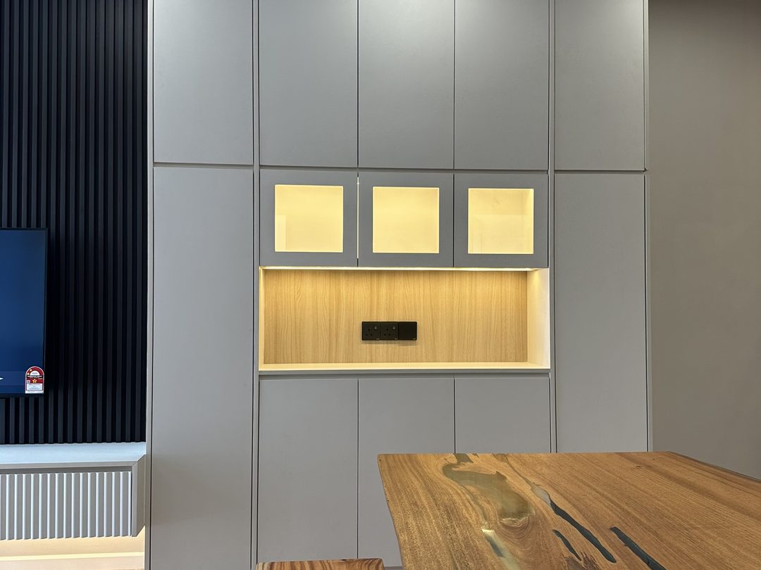 Display cabinet with warm backlit niches