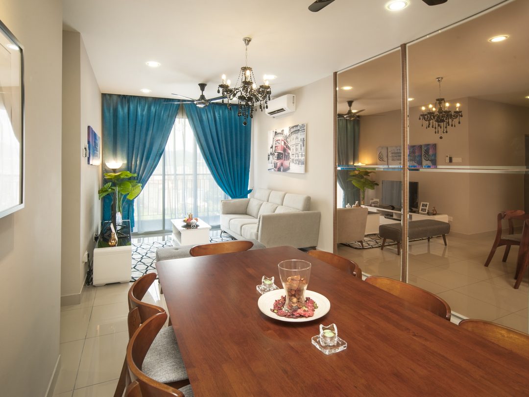Dining and living hall with teal drapes