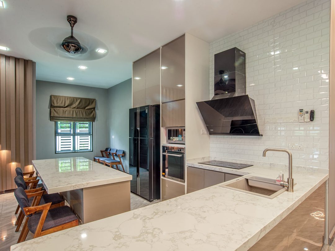Kitchen with marble island and matte black fittings, Nilai Impian