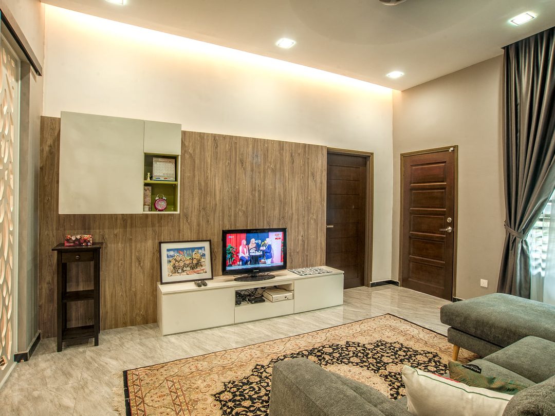 Family hall with fluted feature wall and warm cove lighting