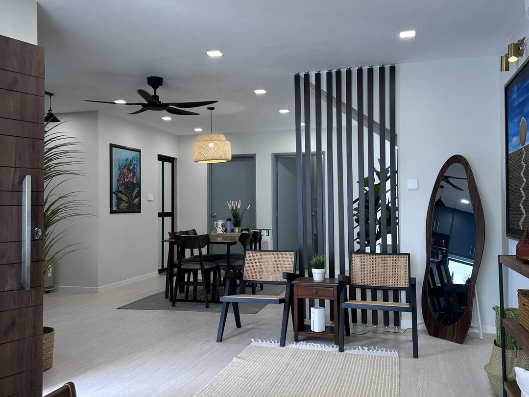 Entry view across the dining hall and lounge with a timber slat partition and candle chandelier