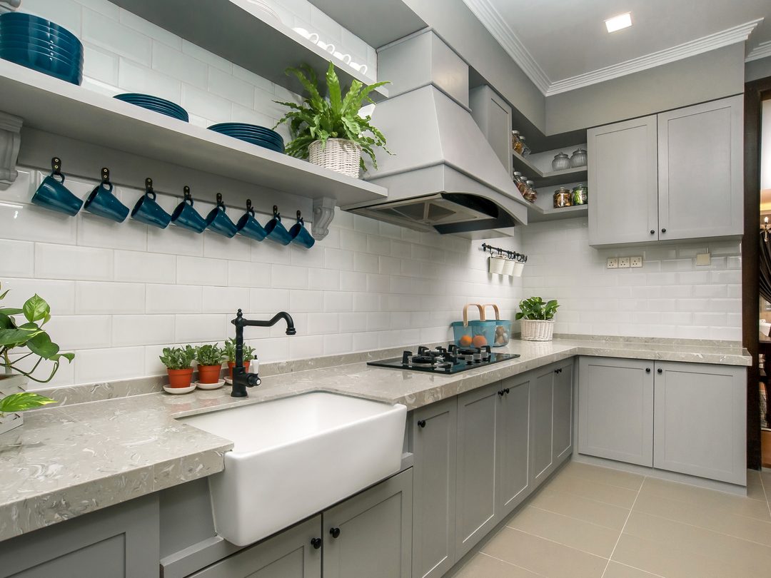 Farmhouse kitchen with apron sink and open shelving