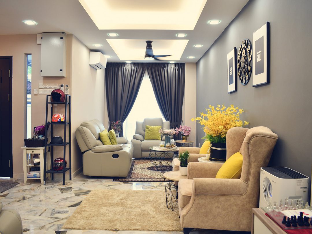 Living hall with cream recliner sofas