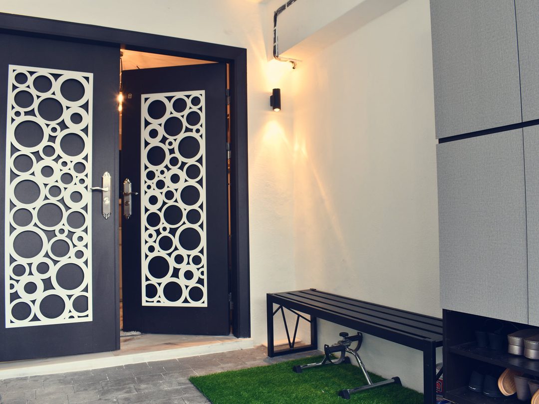 Entry door with laser-cut privacy screen