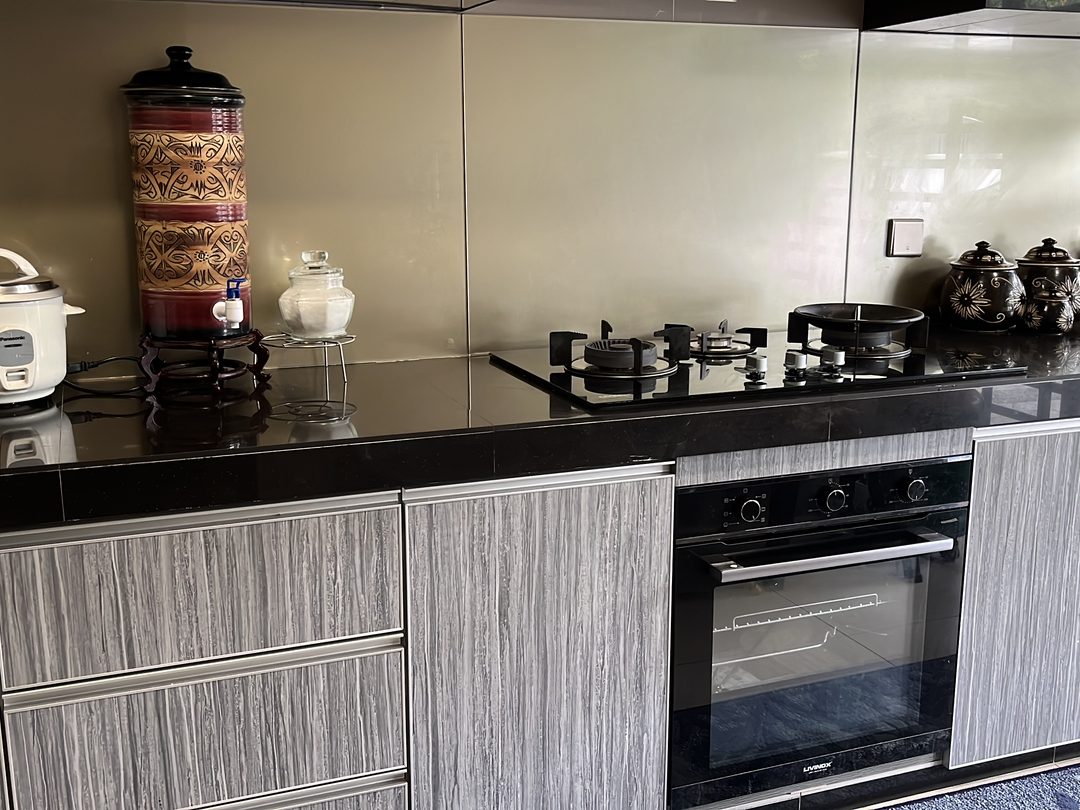 Kitchen with textured grey cabinetry