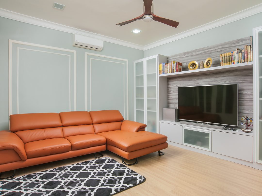 TV lounge with burnt-orange sectional
