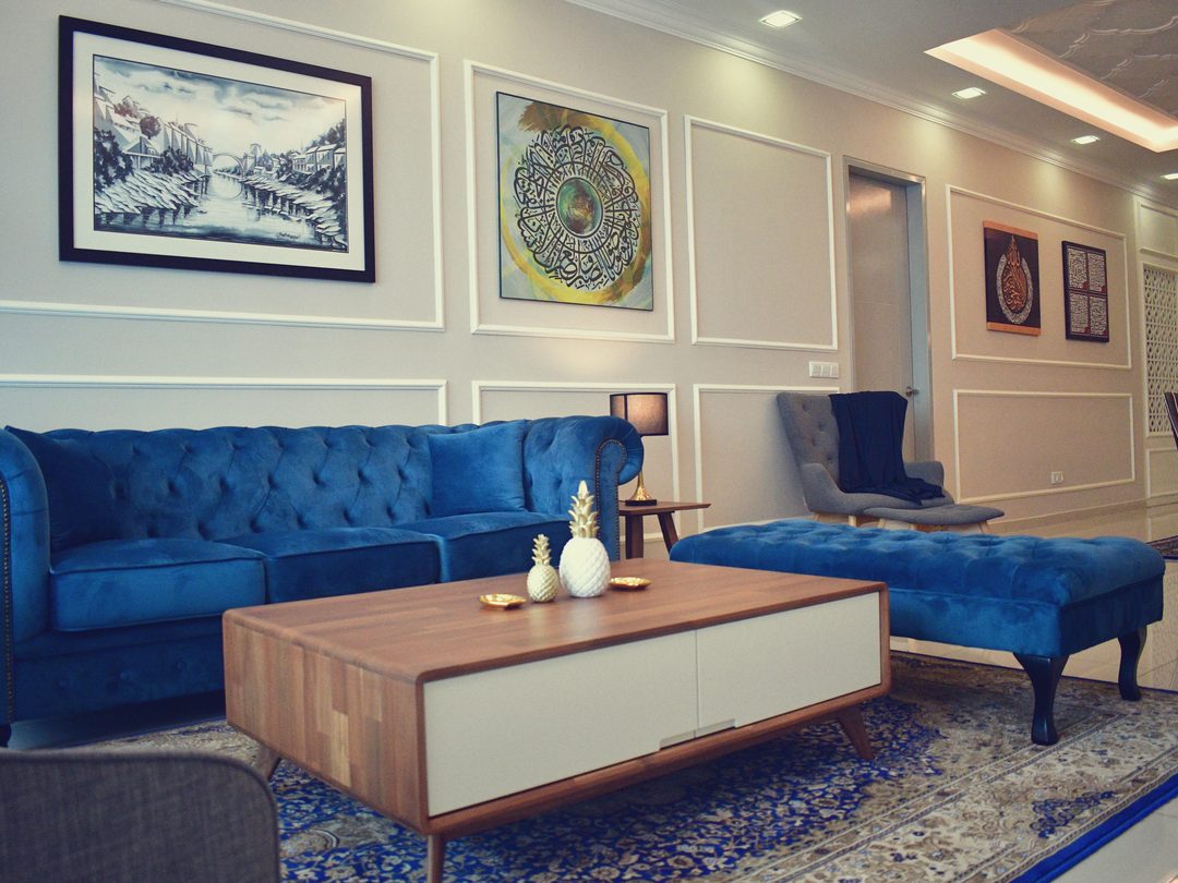 Condominium living room with royal blue tufted sofas, X2 Residensi II