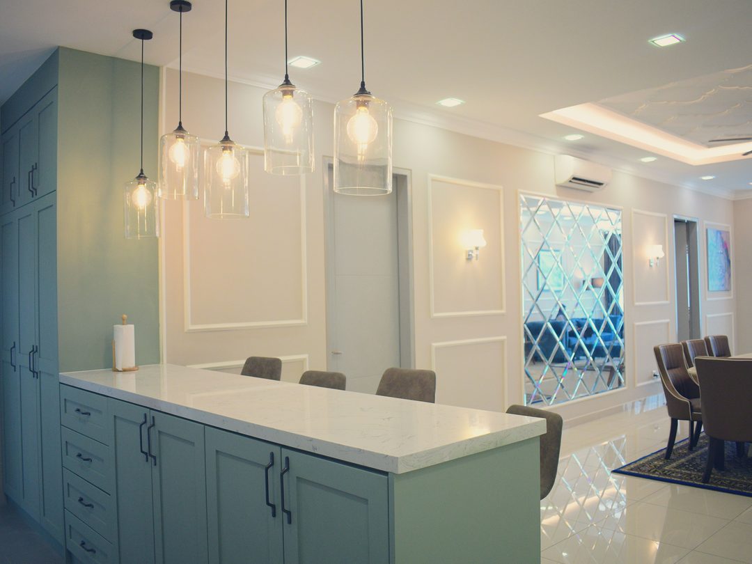 Pantry counter under glass pendant lights